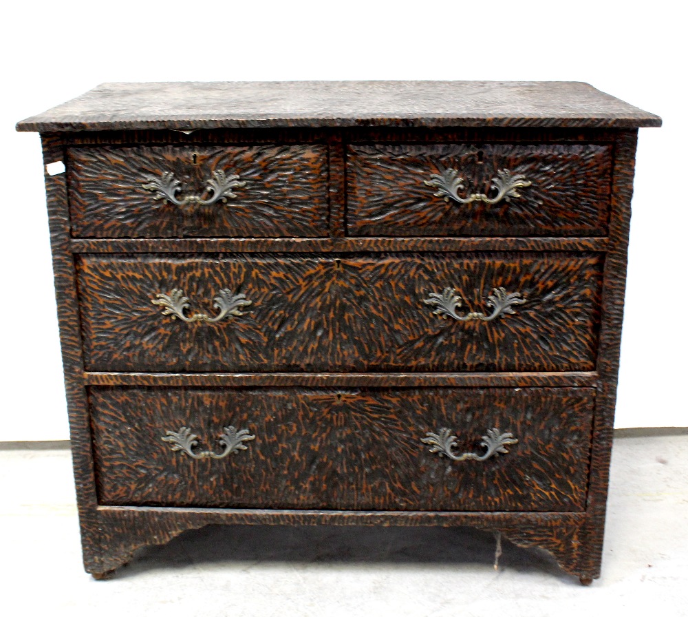 A mid-20th century locally hand-carved wooden chest of drawers, two short and two long, height 78cm,