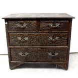 A mid-20th century locally hand-carved wooden chest of drawers, two short and two long, height 78cm,