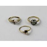 A 9ct gold dress ring set with four pale blue leaf shaped stones, size J,