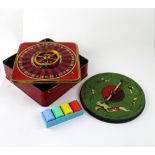 A mid-20th century Virginia Cigarettes 'Turf' tinplate roulette game,