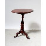 A Victorian mahogany tilt-top occasional table with oval top,