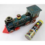 A 1960s vintage Japanese 'Western' battery-powered tin plate toy train and an 'Acme Toys' tin plate