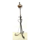 A Victorian copper oil lamp converted to electricity,