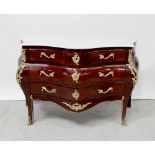 A Louis XV style marquetry inlaid mahogany bombé commode with grey marble top and gilt metal mounts,