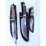 Three collectible vintage hunting knives to include an R Weber Jr, Solingen example,