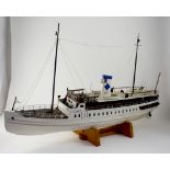 A scratch-built wooden model of a boat 'Cygnet', length 86cm.