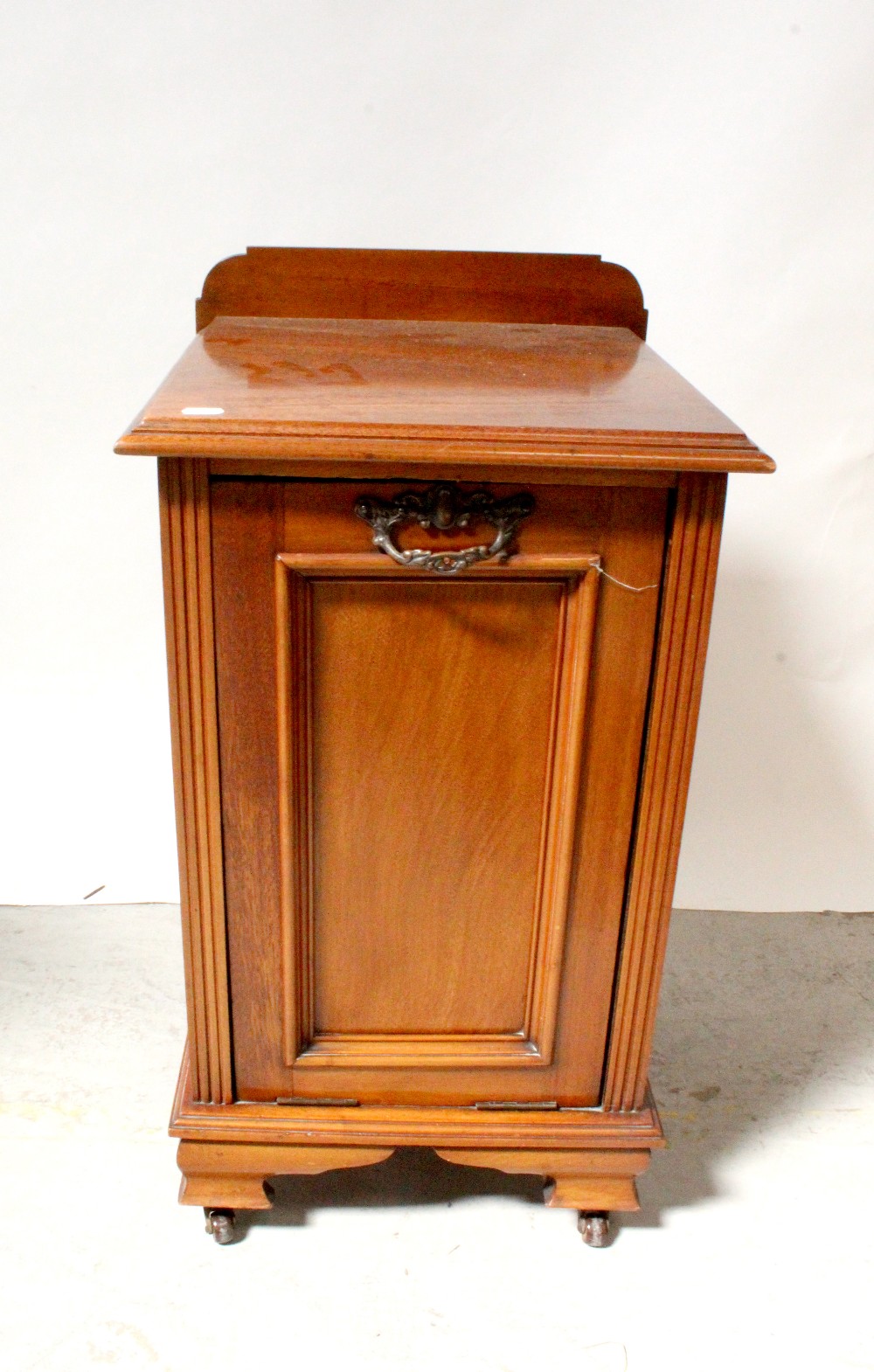 An Edwardian mahogany coal purdonium with fall front and raised on bracket feet to castors, - Image 2 of 2
