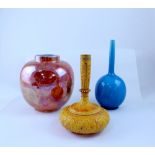 Various items of art and decorative pottery including two Burmantofts bottle vases,