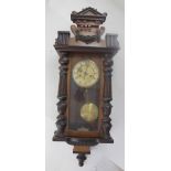 An early 20th century mahogany Vienna-style eight-day wall clock,