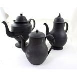 Three Wedgwood Black Basalt ware teapots, height of largest 28cm (some af).