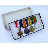A WWI group of three medals to include the 1914-15 Star, British War Medal and Victory Medal to PTE.