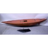 A large scratch-built part finished pond yacht, wood deck and hull with lead keel,