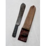 A British military issue machete with scabbard dated 1952.