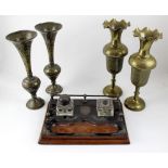 A quantity of assorted Eastern brass vases,