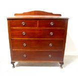 An early 20th century mahogany chest of two short over three long drawers,