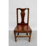 A pair of Victorian mahogany vase-back dining chairs with stuff-over seats and front cabriole legs,