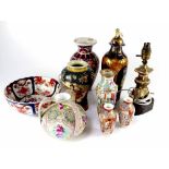 A mixed lot of assorted Oriental items to include a pair of Japanese Imari plates with wavy edges,