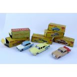 Six Dinky Toys boxed diecast cars to include a Triumph Herald with windows and independent