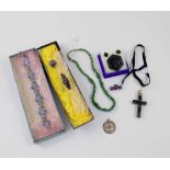 A Victorian agate cross on ribbon, Longfellows scarf pin, bog oak horseshoe brooch, jet brooch,