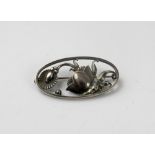 An oval silver brooch by Georg Jensen, no 274, approx 0.27ozt.