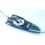 A modern plastic remote control speedboat with twin propellers 'Ben', length 70cm.