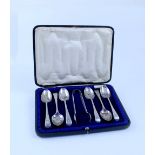 A set of six Cooper Bros & Sons Sheffield silver teaspoons and tongs, 1917, in presentation case.