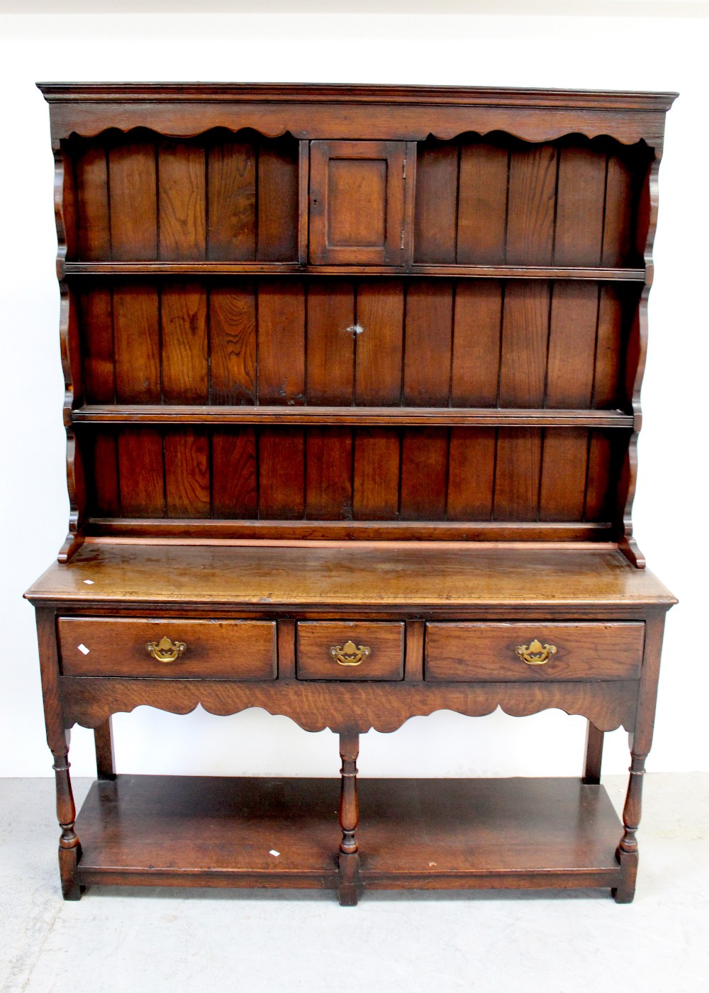 A reproduction small oak dresser,