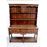 A reproduction small oak dresser,