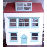 A modern white painted large three-storey dolls' house with sectioned hinged lid and single hinged