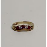 A 9ct yellow gold, ruby and diamond dress ring, size L, approx 2.9g.