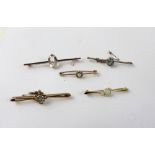 Five various 9ct gold bar brooches to include two set with opals,