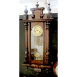 A 19th century mahogany Vienna regulator wall clock, height 98cm.