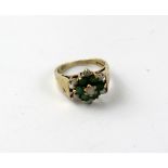 A 9ct gold dress ring set with emeralds and opals, size I, approx 2g.