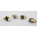 A 9ct gold dress ring set with a blue sapphire, size H, a 9ct gold ring set with pale blue stone,