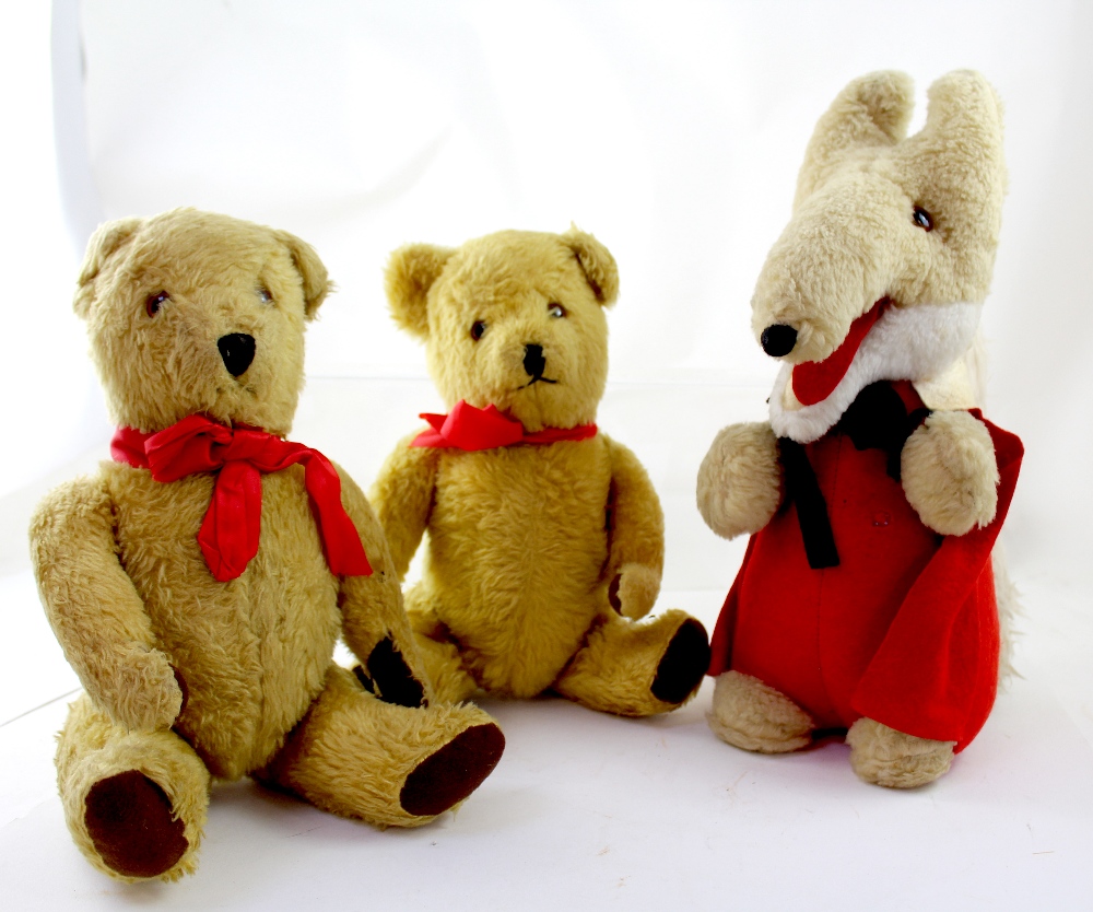 Two 20th century Teddy bears with glass eyes, stitched nose and mouth,