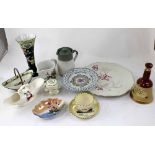 Various items of collectable pottery including Bells decanter, a large Spanish bull charger,