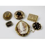 A large cameo brooch set in pinchbeck, 56.