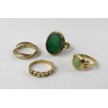 A 9ct gold dress ring set with a large oval green stone, size I,