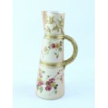 A Royal Worcester blush ivory with gilt and floral decoration tall ewer vase with puce Worcester