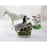 A Beswick model of a grey mare, black stamp to base,