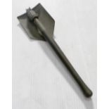 A military issue entrenching tool.