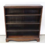 A mahogany floor standing bookcase with carved Greek Key frieze on bracket feet, height 98cm,