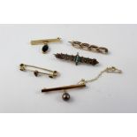 Five various 9ct gold bar brooches to include an Edwardian bar brooch set with turquoise,