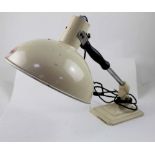 A 20th century Pifco infrared radiant heat lamp, painted in cream.