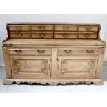 A late 19th century rustic pine dresser base/kitchen chest,