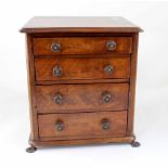 A 19th century mahogany miniature tabletop specimen cabinet of four drawers,