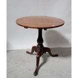 A late 18th/early 19th century mahogany tripod occasional table, diameter of top 60cm.