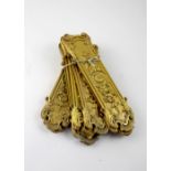 WITHDRAWN A set of eighteen gilt metal door plates with scroll and acanthus leaf decoration,