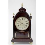 A 19th century mahogany bracket clock, the painted dial set with Roman numerals,