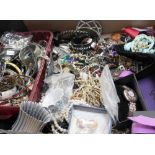 A large quantity of costume jewellery to include synthetic pearls, snake rope twist necklace etc.